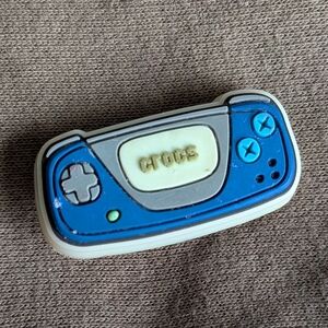 CROCS Blue and Gray Handheld Game Console Shoe Charm.